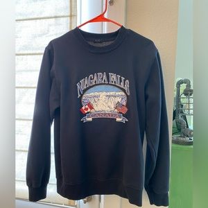 Women’s crew neck sweatshirt. Blue. One size.